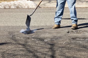 Pothole Filling in Whitesboro, Oklahoma by Ready to Go Road Builders