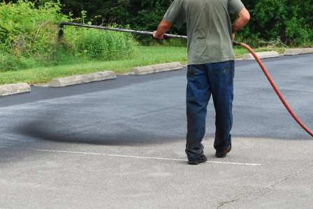 Asphalt sealcoating by Ready to Go Road Builders